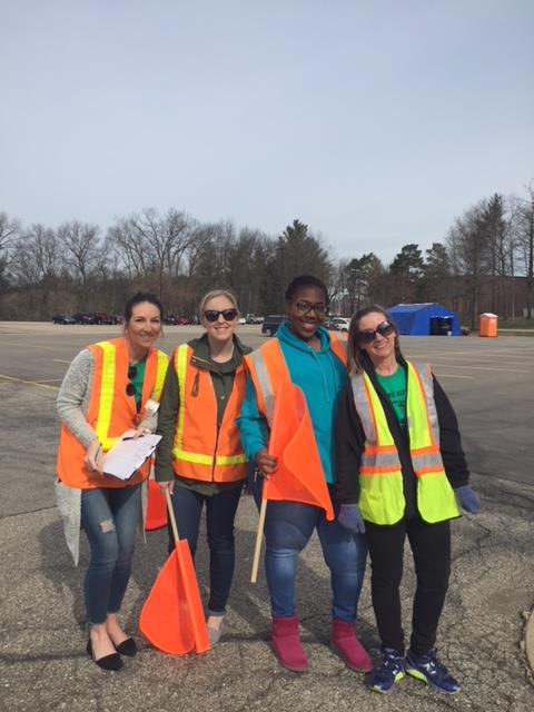 Photo of four event volunteers